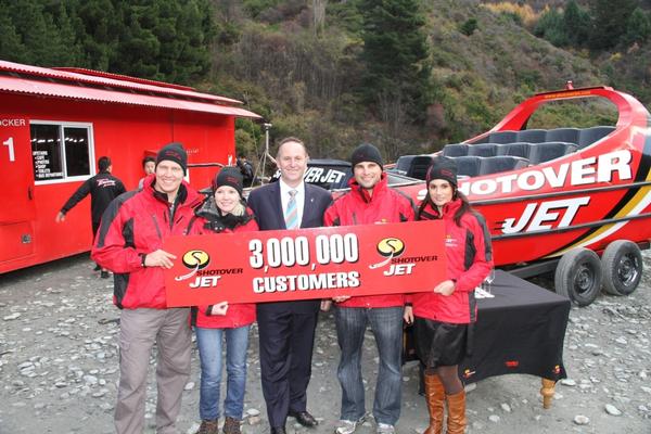 Prime Minister John Key with Shotover Jet's 3 millionth passengers